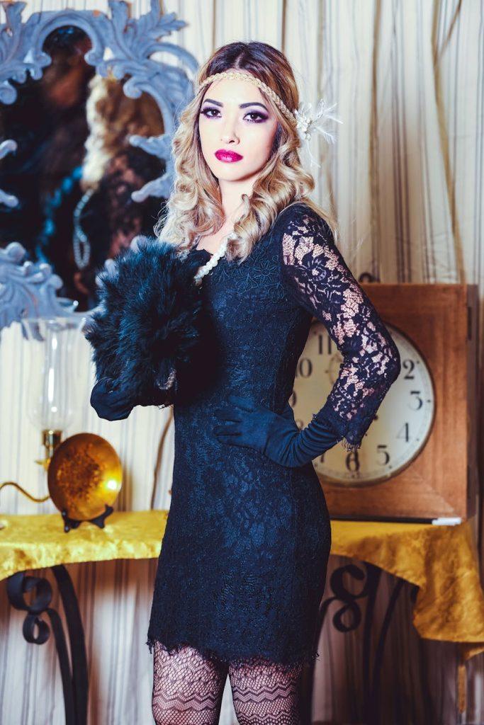 Woman in stylish, monochrome outfit demonstrating budget luxury style.