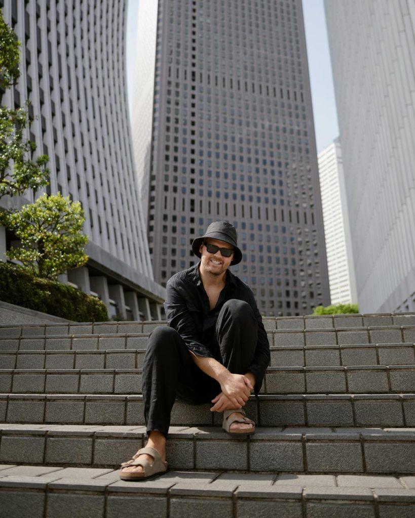 Woman enjoys scenic view from first-class window seat on a modern airplane.